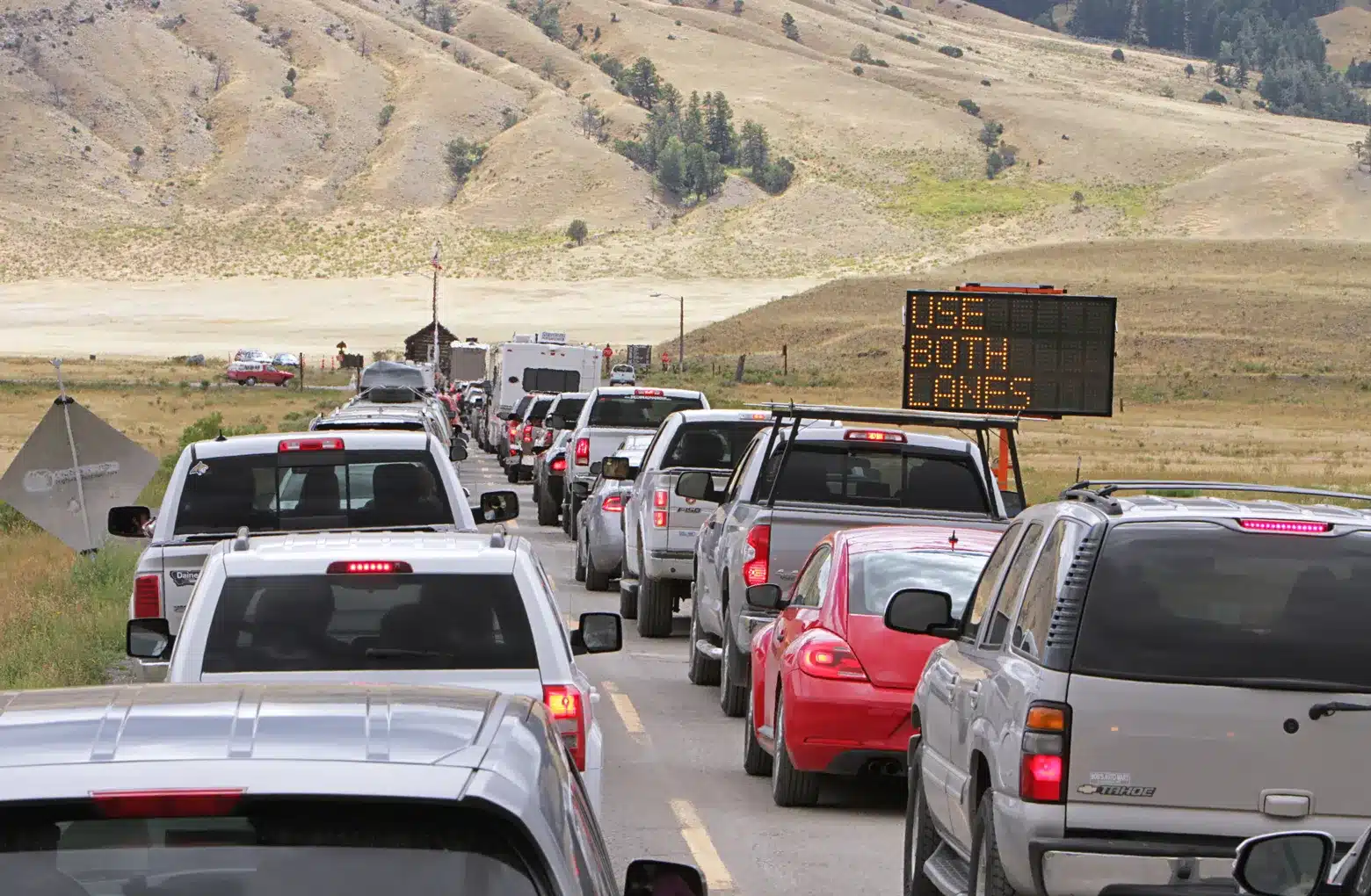 Traffic waits in queue at the North Entrance to Yellowstone National Park, July 2015. That year, Yellowstone saw about 4.1 million visitors. Last year, the park admitted half a million more visitors through its gates. Photo by Jim Peaco/NPS